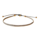 TAI JEWELRY Bracelet Grey Handmade Silk Bracelet With Gold Beaded Accents