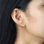 TAI JEWELRY Earrings East West Baguette Huggie