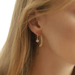 TAI JEWELRY Earrings Gold Huggie With Single CZ Charm